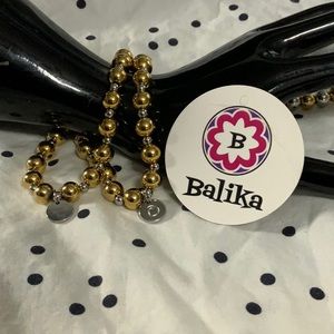 Two tones stainless steel ball stretch bracelet. Gold/Silver